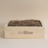 Wooden box with straw branding on a beige background